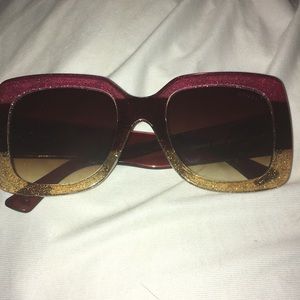 Gucci pink and champagne glasses.